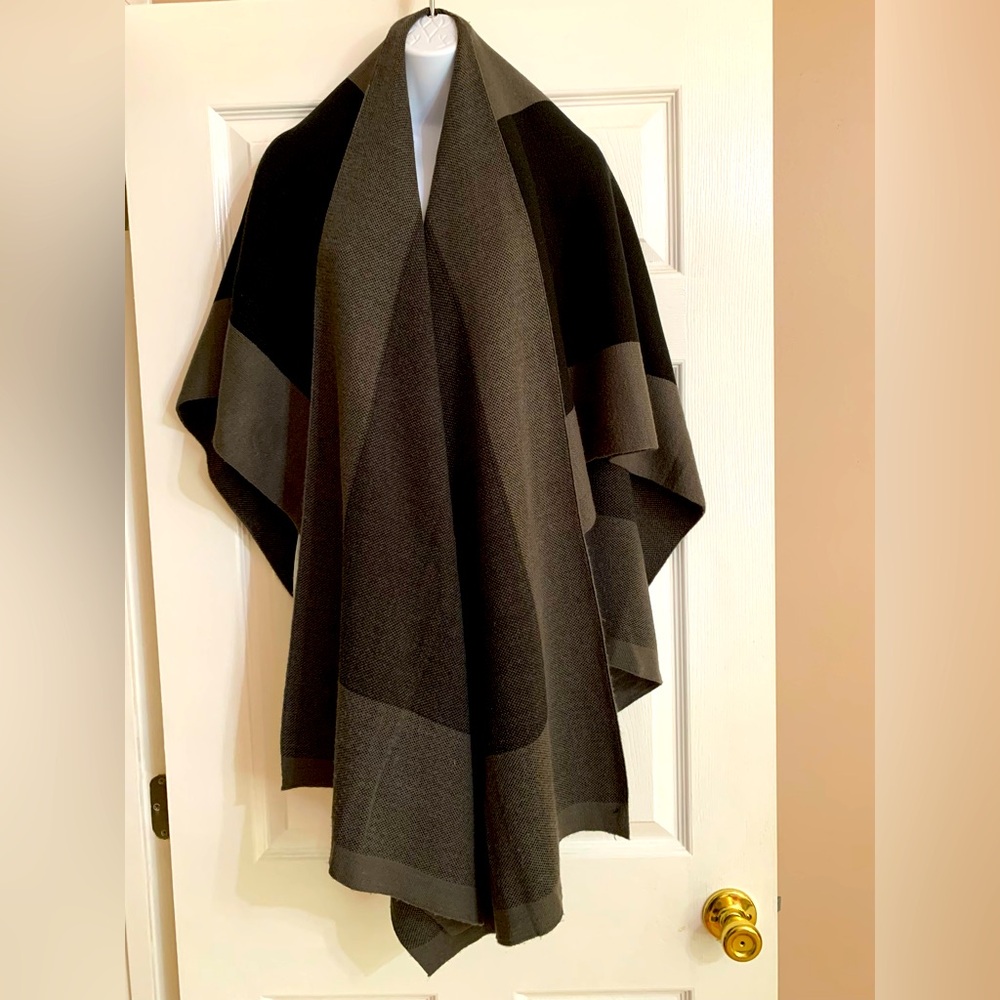 Two-toned gray and black nicely made warm Shawl.  One size fits all.